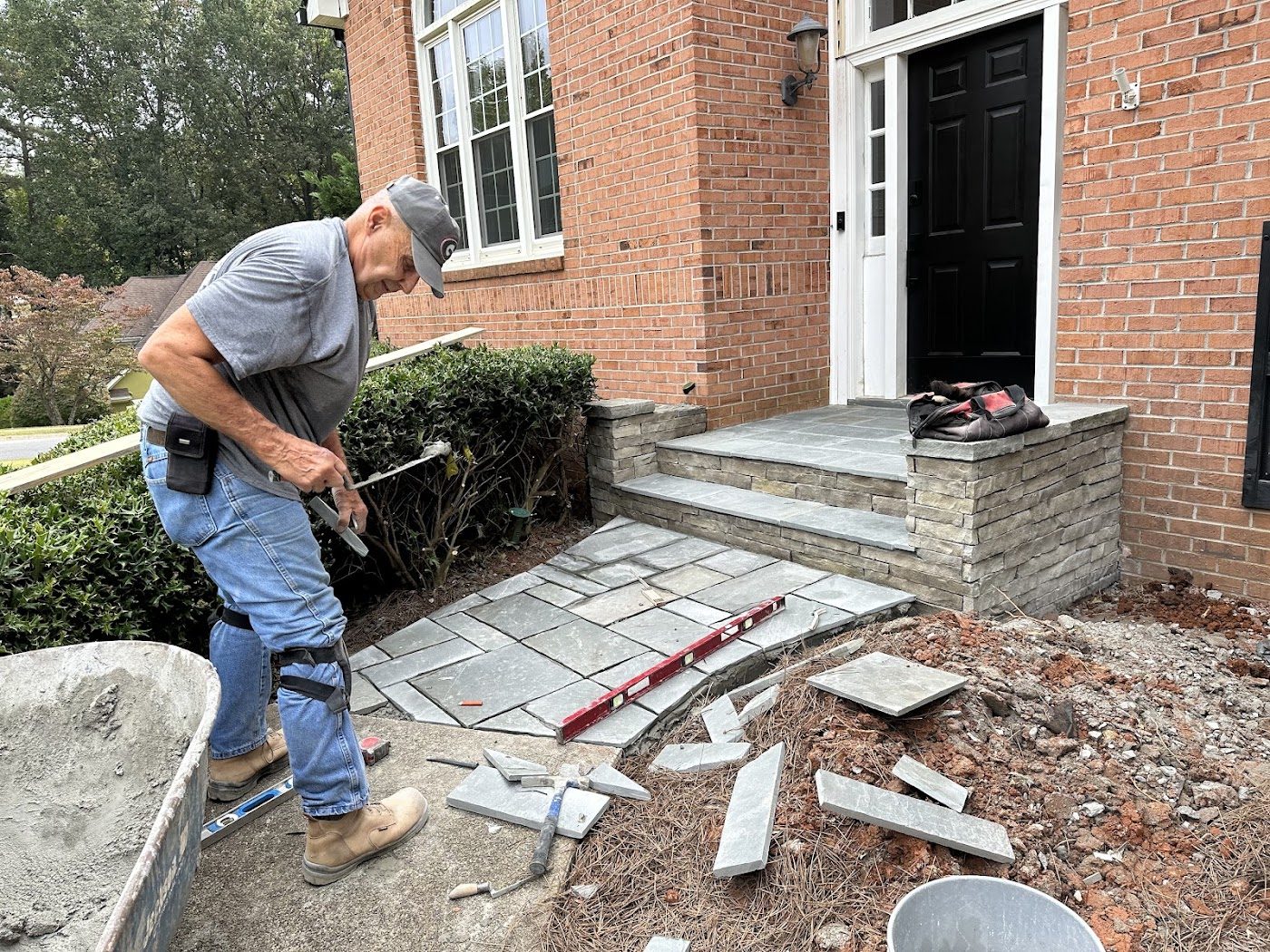 All Masonry at work on a stone step